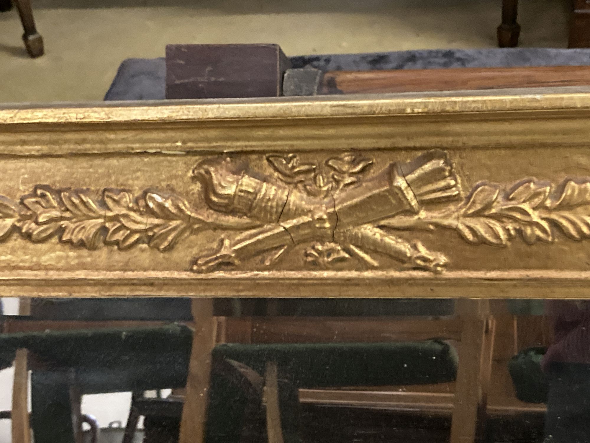 A Victorian gilt-framed overmantel mirror, width 110cm, height 61cm